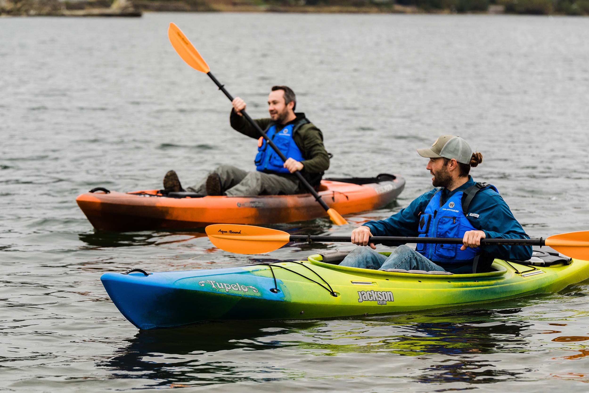 Two men kayaking near Headlands