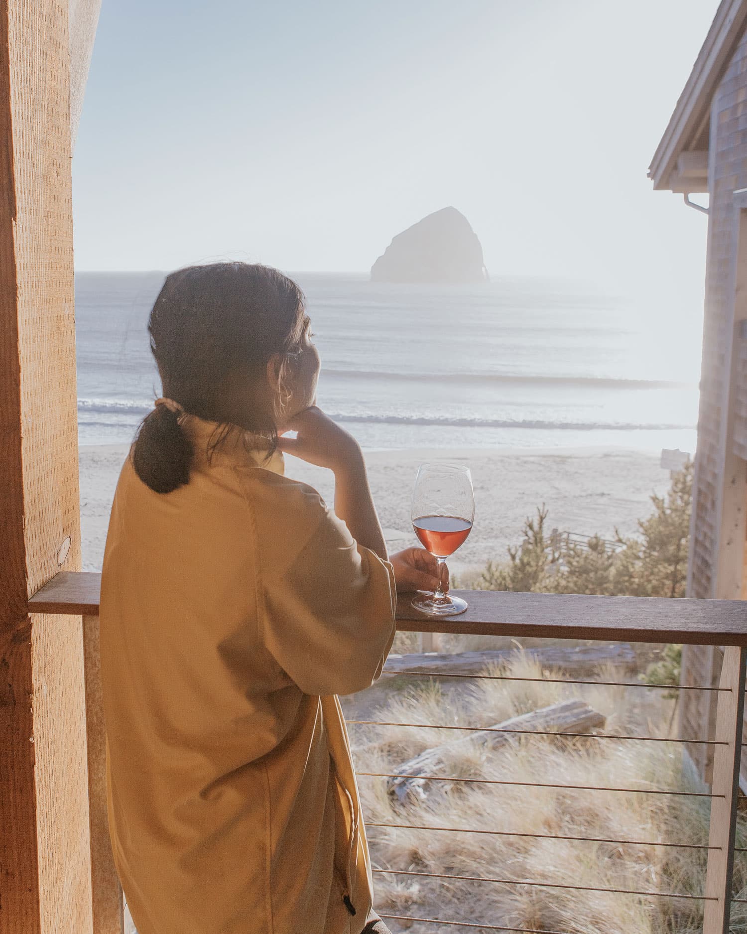 Lady Drinking Wine On A Balcony