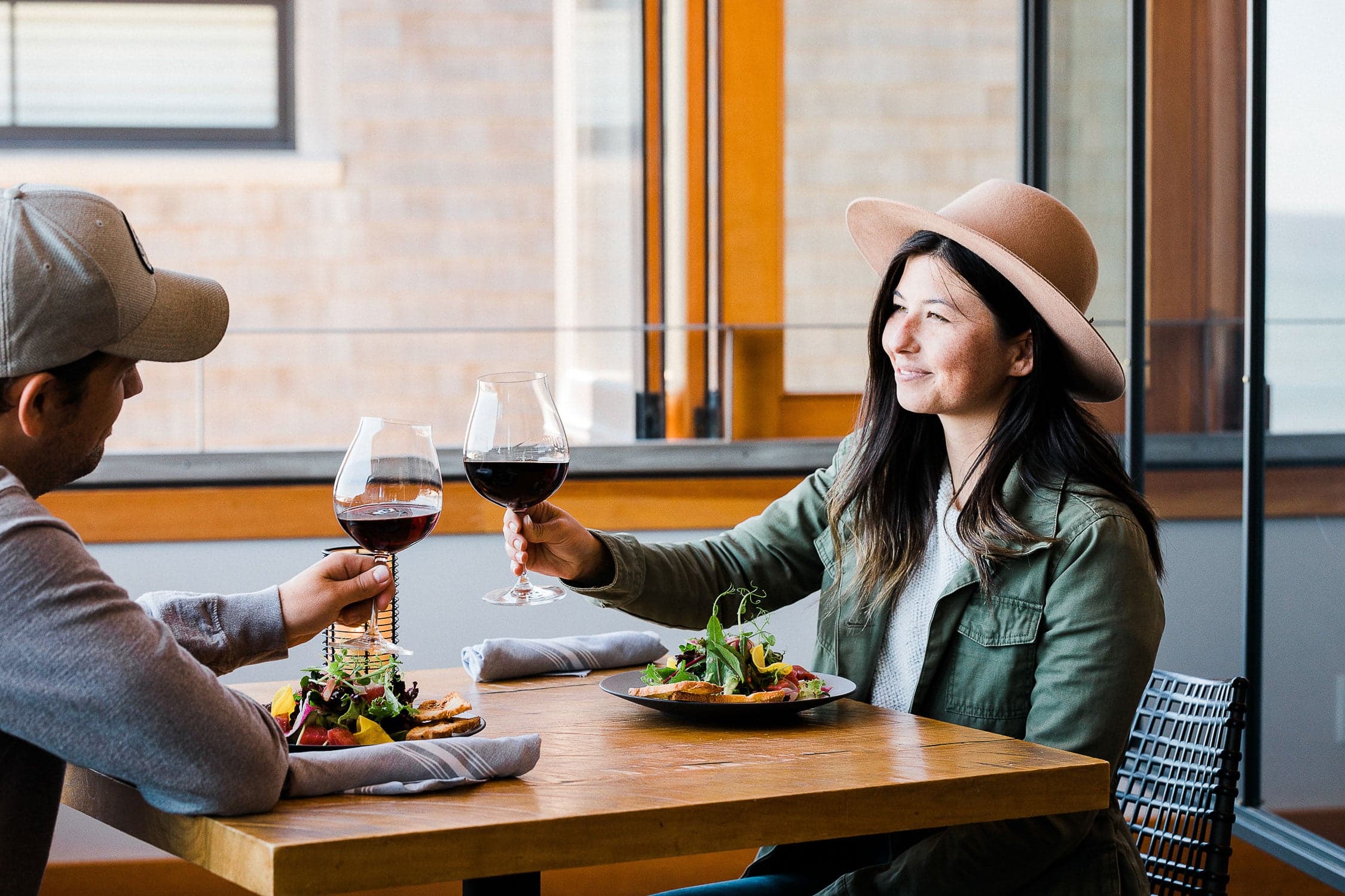 Couple Drinking Wine With Salad
