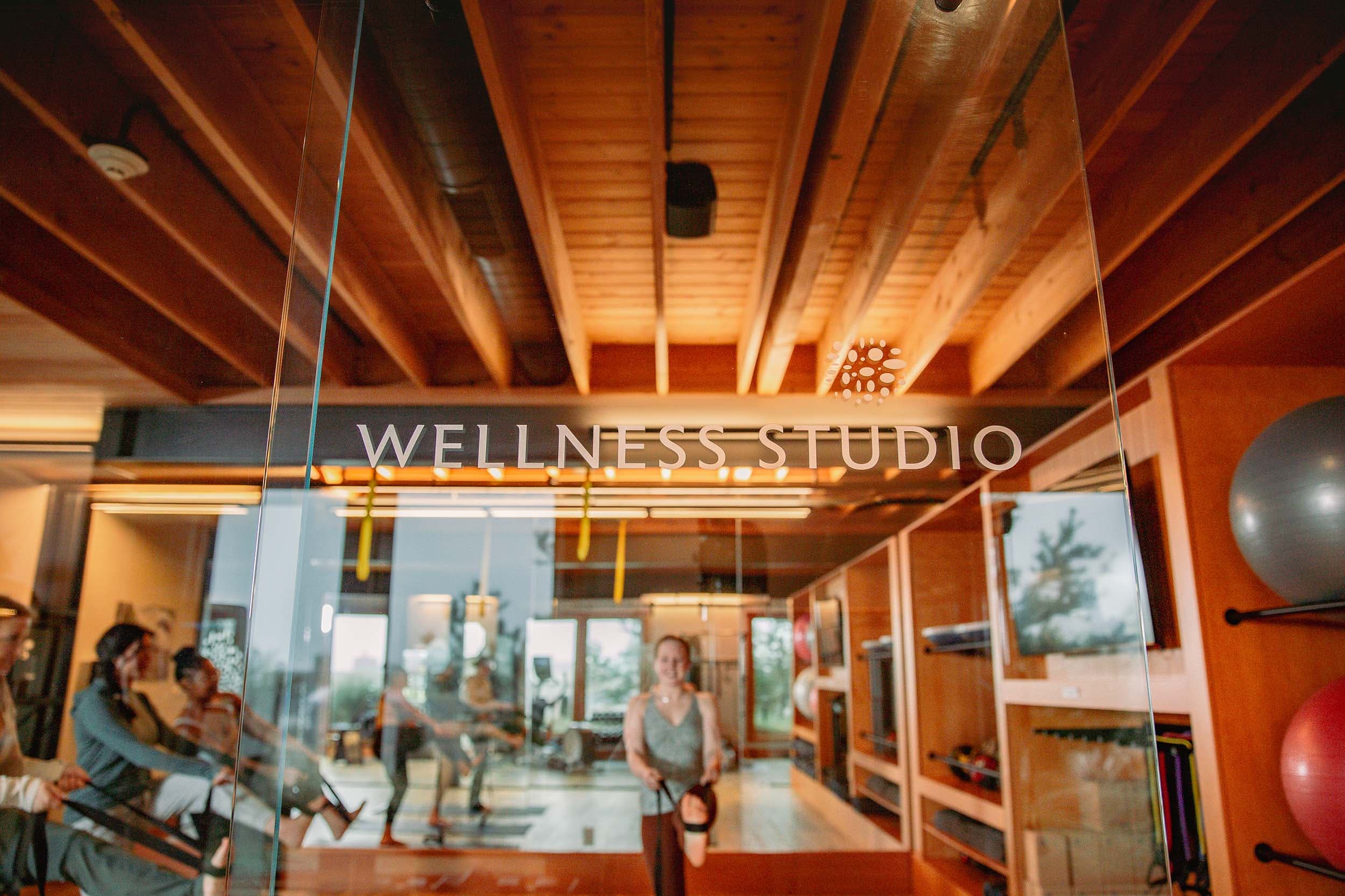The glass door to the Wellness Studio at TidePools