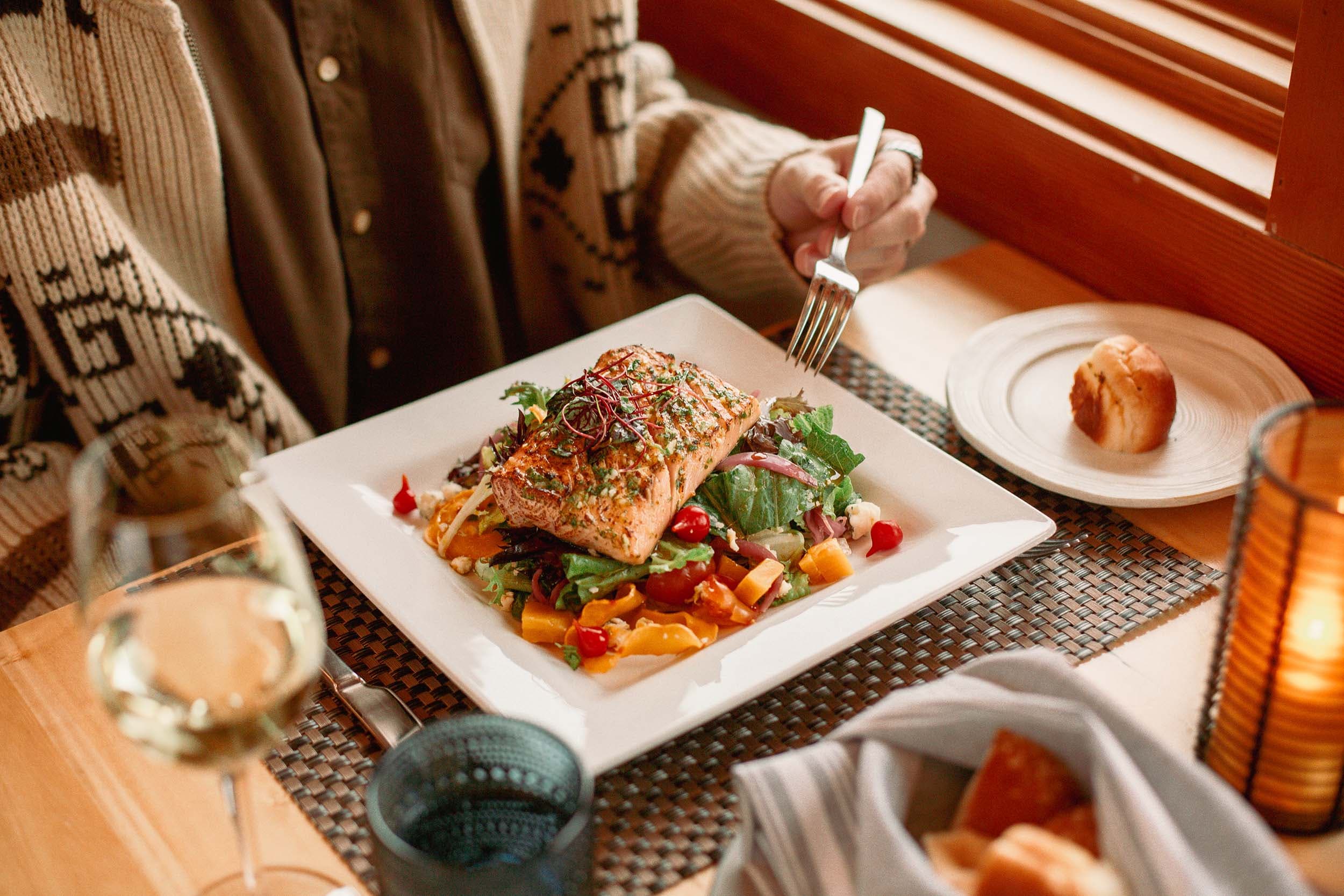 A salmon dish on a salad at Meridian restaurant near Headlands