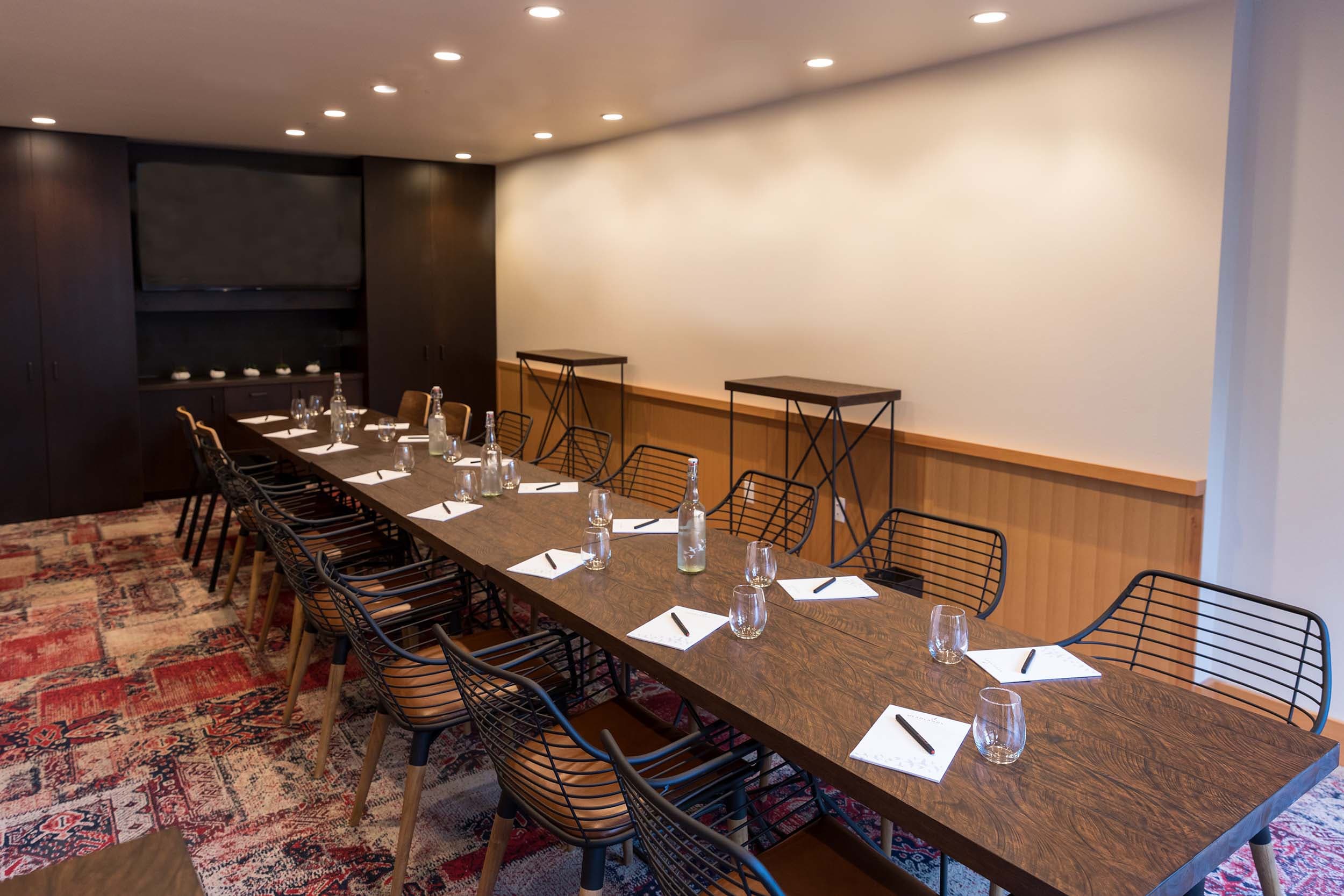 A long table with 16 seats in the Longitude venue at Headlands