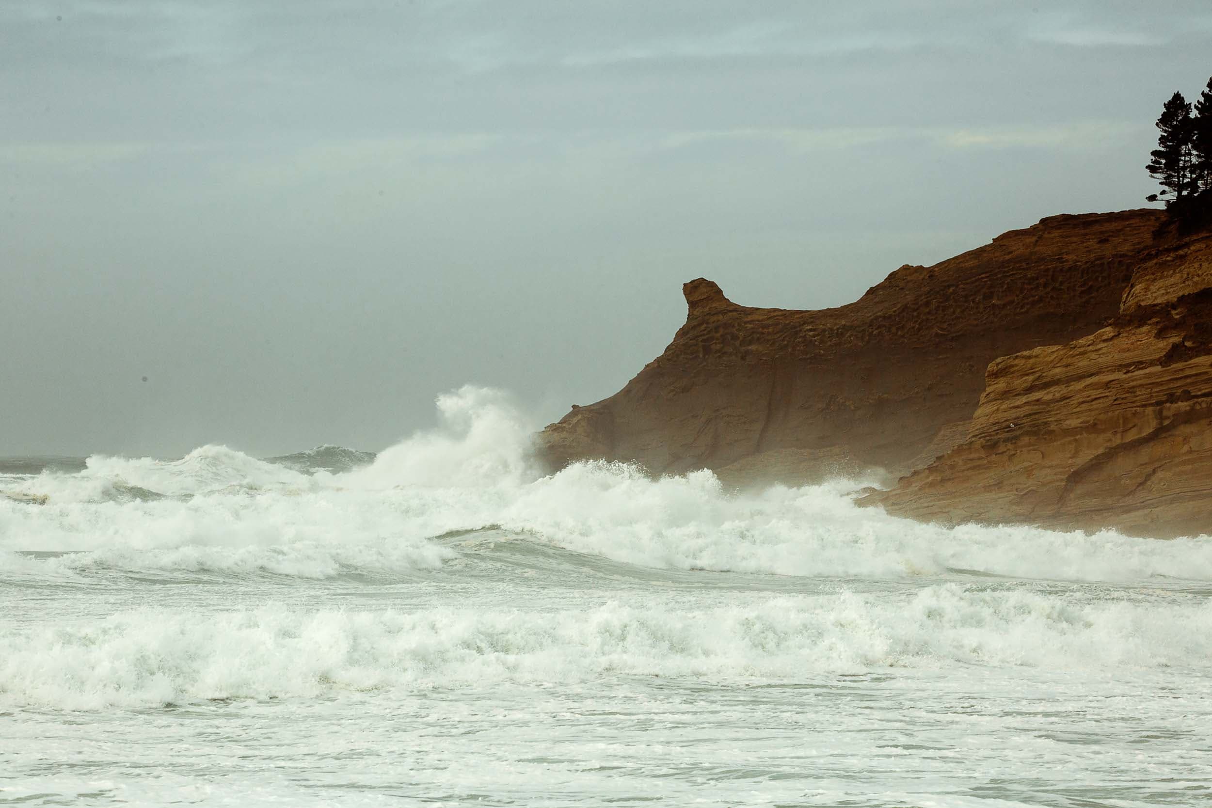 Tides hitting some rocks near Headlands during a storm