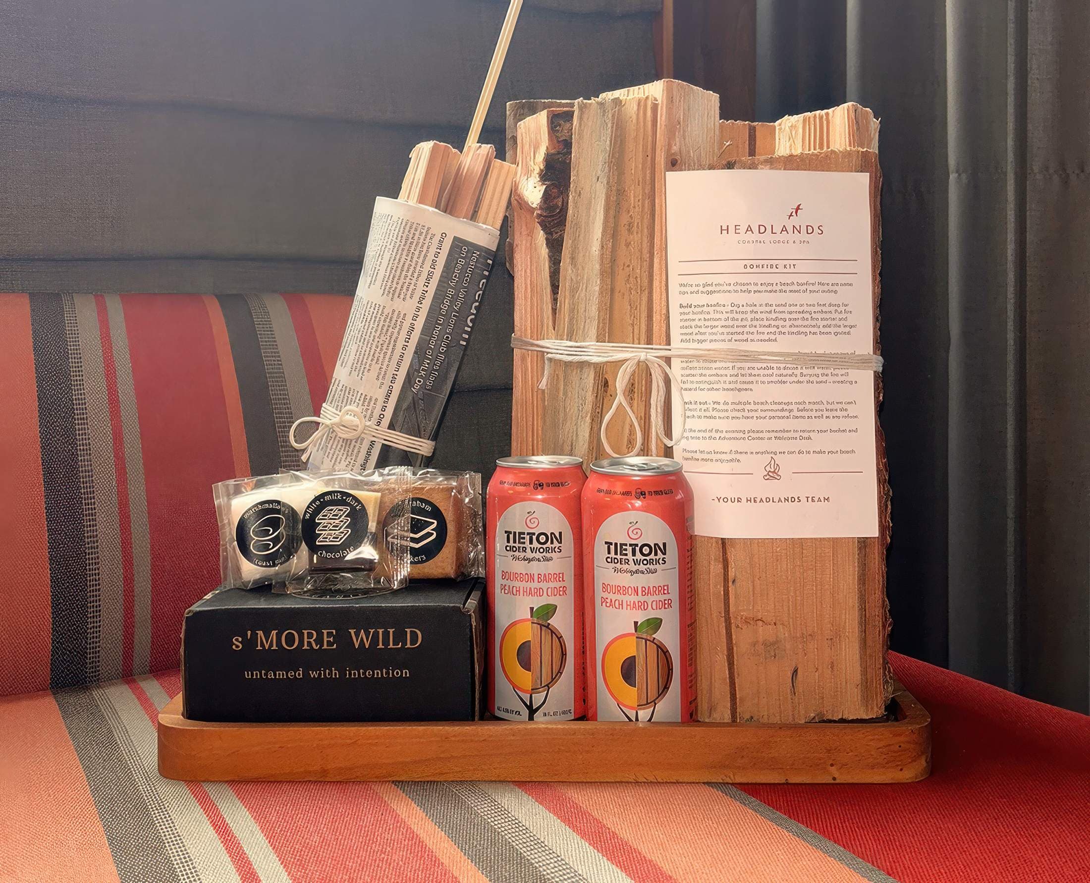 A welcome package with a S'mores kit, beverages and a bundle of fire wood at Headlands