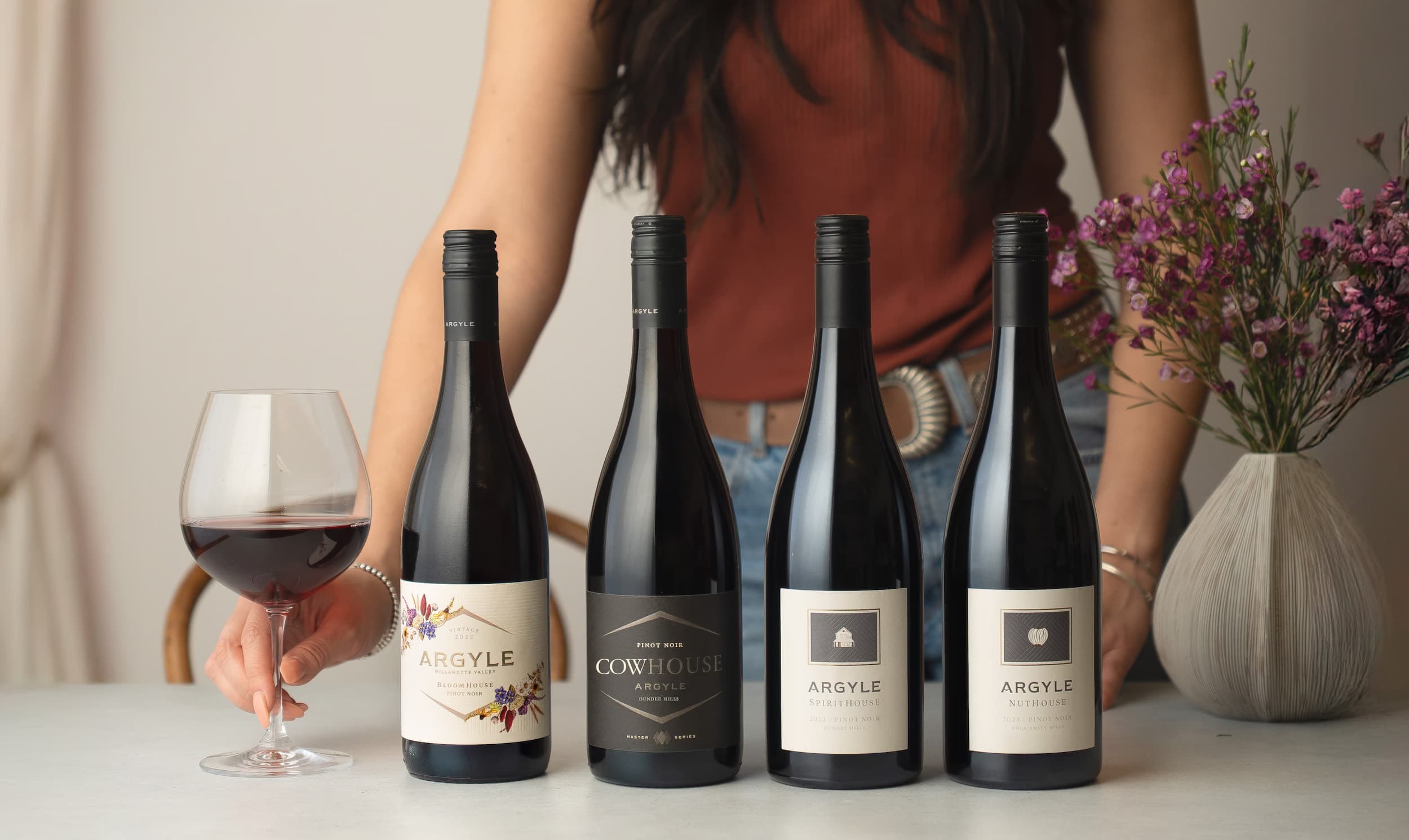 Four bottles of Argyle wine set up for a tasting